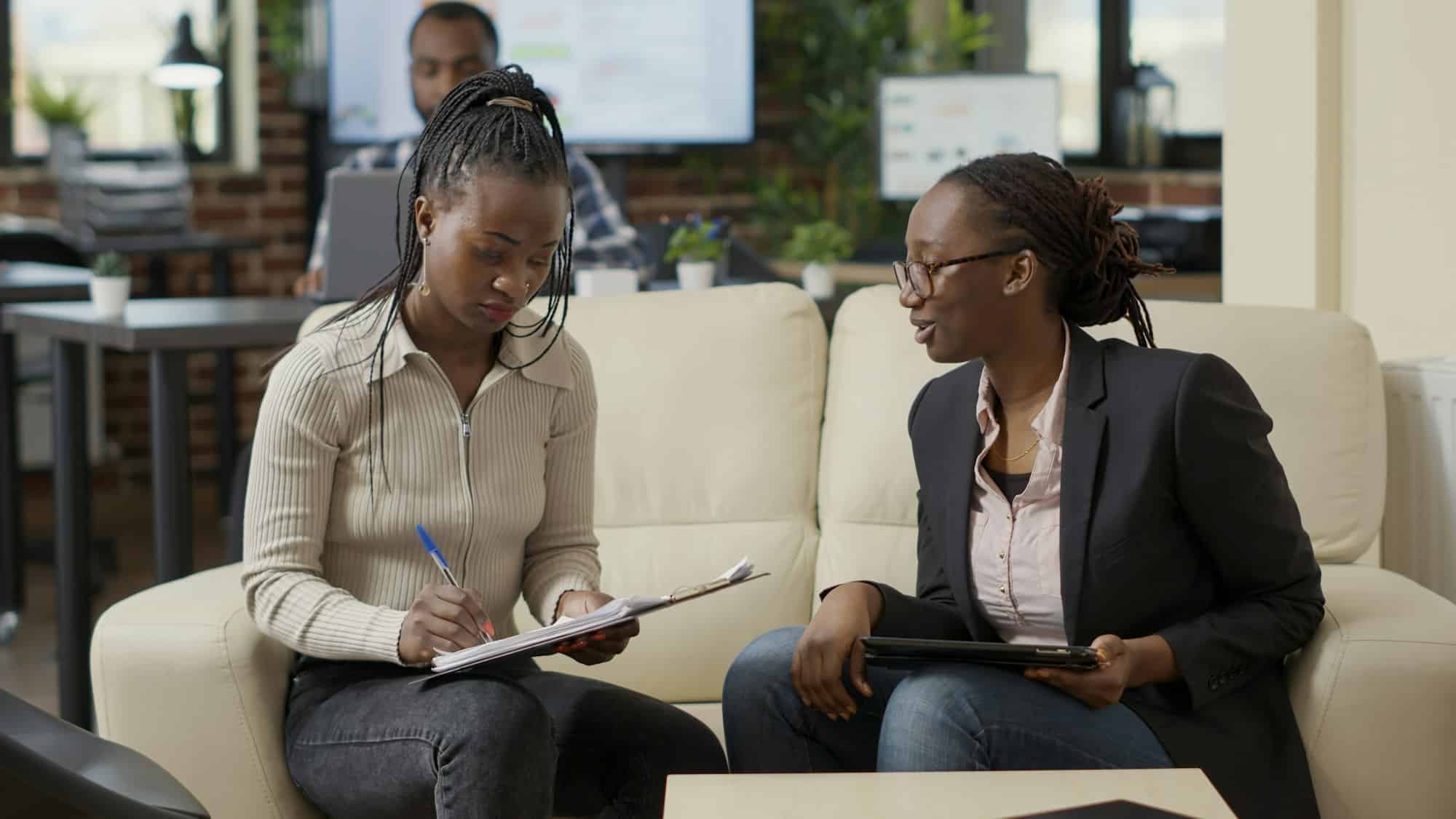 Business women shaking hands and accepting collaboration deal