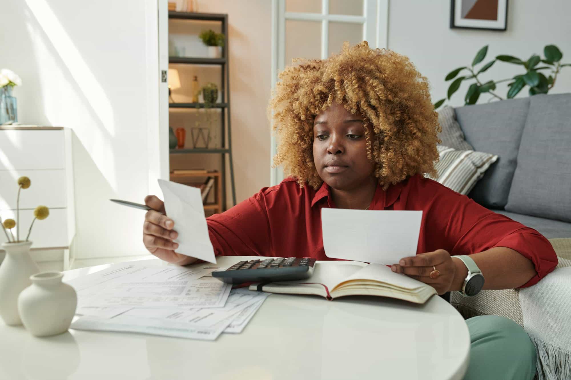 Woman doing finances at home